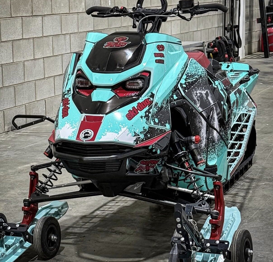 Turquoise custom snowmobile graphics