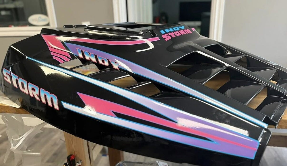 Pink and blue vintage Polaris Storm hood decals