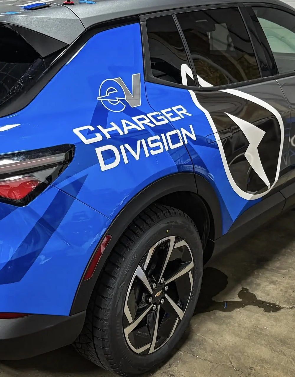 Blue and black branded car graphics