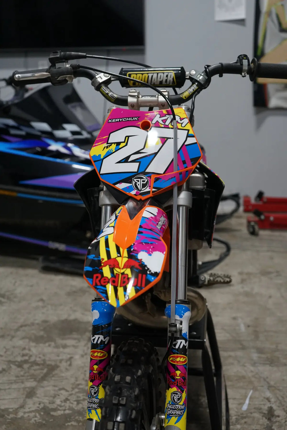 Front number plate and colourful dirt bike graphics